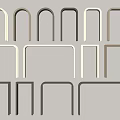 Various Stylish Door Arches In Light And Dark Gray Displayed On White Wall