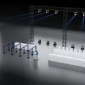 Event Check-in Area With Lighting Truss Spotlights White Chairs And Blue Barriers