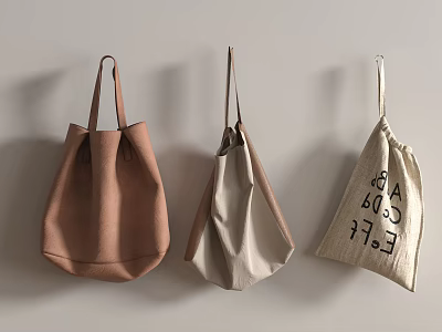 Three Stylish Hanging Bags in Brown and Beige with Text Print on Wall 3d model