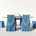 Dining Table Set With Blue Chair Covers White Tassel Decor And Wooden Frame