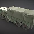 Green Military Truck With Canvas Covered Cargo Bed And Six Wheels