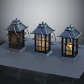 Three Traditional Metal Lanterns With Grid Panels And Lit Candle On Gray Platform