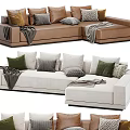 Modern Light Sectional Sofa With Green Gray Throw Pillows And Blankets 3d model
