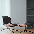 Modern Leisure Chair with Black Cushion Wooden Base and Matching Ottoman in Minimalist Interior