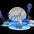 Marine Themed Decorative Display With Blue Jellyfish Shell Coral And Stones