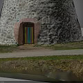 Stone Windmill Building With Dome Roof Stone Walls Grassland Pathway And Wooden Door