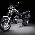 Classic Blue Motorcycle With Black Seat Chrome Details And Retro Design