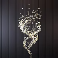 Artistic Golden Butterfly Shaped Chandelier Hanging And Illuminated Against Black Background