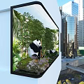 Large Computer Display Screen Showing Pandas In Bamboo Forest With Cityscape On Modern Building Wall