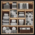 Neatly Arranged Gray And White Towels In Wooden Compartments With Folded And Rolled Styles