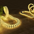 Illuminated Outdoor Chair In Park With Circular Light Structures And Trees At Night