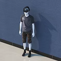 Model Standing in Gray T-shirt and Camouflage Shorts with Black Helmet Against Blue Wall