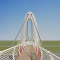 White Arch Bridge With Cables Wooden Deck And Green Grass Under Blue Sky