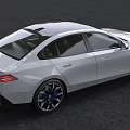 White BMW Sport Sedan With Modern Sleek Exterior Design And Alloy Wheels