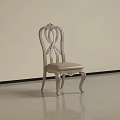 Elegant Silver Dining Chair With Carved Backrest Upholstered Seat And Curved Legs