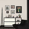 Modern Console Sideboard In Living Room With Framed Art Potted Plant And Decorative Books