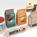 Assorted Packaged Food Products with Chocolate Caramels Coffee Beans Cream Honey and Chocolate Spread
