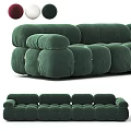 Green Velvet Modular Sofa With Plush Cushions Rounded Arms And Metal Accents