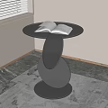 Black Round Side Table with Open Book and Unique Glossy Base on Marble Floor 3d model