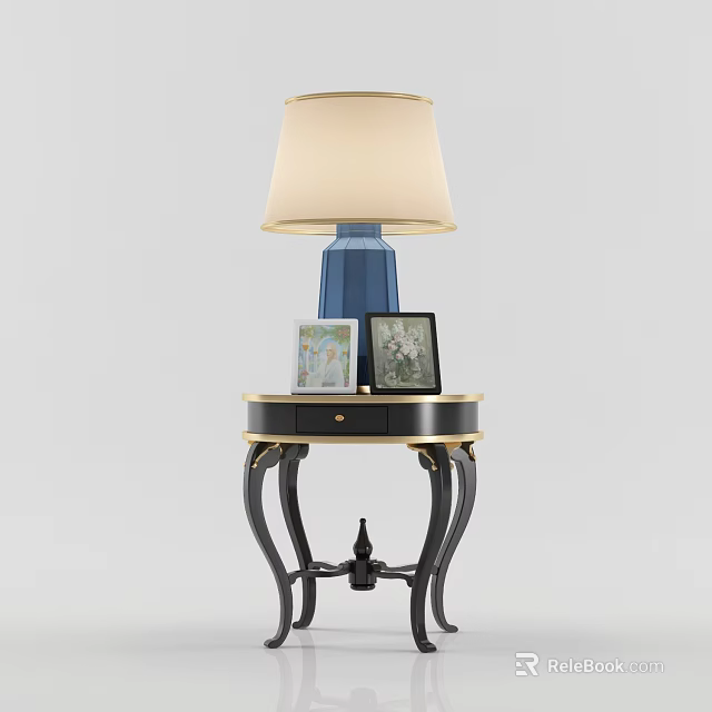 Round Side Table With Blue Base Table Lamp Beige Lampshade And Photo Frames 3d model