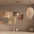 Natural Pendant Lights with Woven Rattan and Feather Shades in Neutral Interior And Pampas Grass