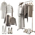Neutral Tones Clothes Collection Featuring Knit Sweaters Fur Coats Scarves And Boots On Hanging Display Racks