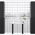 Modern Glass Block Wall with Black Side Panels and Round Table Green Plant Decoration