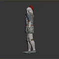 Man In Medieval Full Body Armor With Red Helmet Standing Against Gray Background