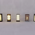Five Modern Floor Lamps With Different Decorative Shades And Dark Bases