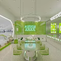 Modern Green Themed Milk Tea Shop Interior Design with Open Counter and Seating Area