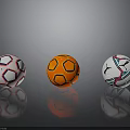 Colorful Soccer Balls With Red White Orange And Blue Patterns On Reflective Background