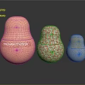 Decorative Matryoshka Style Objects With Orange Wavy Red White Speckled And Gray Dotted Textures