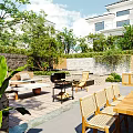 Modern Garden Landscape With Villas Green Plants Outdoor Seating Stone Pavement And Courtyard Area