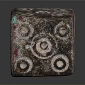 Decorative Dice With Circular Patterns And Textured Red Green Copper Surface On Black Background