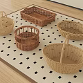 Woven Storage Baskets In Various Shapes For Home Organization On Checkered Rug