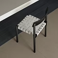 Modern Single Chair with Black Frame and White Woven Seat Design