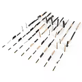 Black And Gold Slender Tools Arranged On White Background