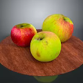 Ripe Red And Green Apples Neatly Arranged On Round Wooden Tray