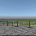 Metal Grid Design Fence With Green Grass Blue Sky And Neatly Paved Ground