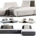 Modern Sectional Sofa In Gray Beige White With Throw Pillows And Soft Blankets 3d model