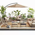 Comfortable Outdoor Sofa In Modern Lounge Area With Umbrella Coffee Table And Green Plants