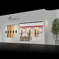 Modern White Exhibition Booth With Green Plant Display Panels And Lighting