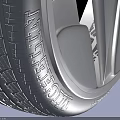 Black Car Tire With Modern Silver Alloy Wheel Rim And Stylish Spoke Design