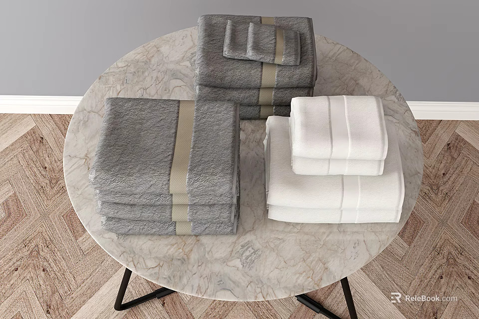 Gray and White Towels Stacked With Striped Bands On Round Marble Table 3d model 