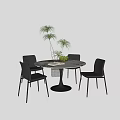 Modern Round Negotiation Table with Black Chairs Book Green Fruits and Plants