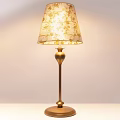 Elegant Table Lamp With Cream Floral Patterned Shade And Golden Stem Base