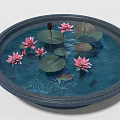 Round Garden Ornament With Pink Lotus Flowers And Lily Pads In Water