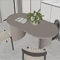 Modern Dining Table Set With Oval Top Woven Chairs Open Book And Green Plant Vase
