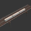 Silver Passenger Train With Large Glass Windows And Multiple Carriages On Railway Tracks