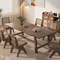 Wooden Dining Table Set With Six Rattan Back Chairs And Potted Plant Fruit Bowl Book